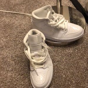 Air Jordan All White 1’s.